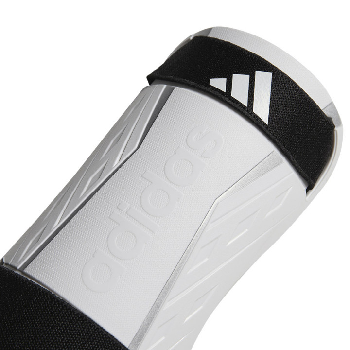 Nagolenniki piłkarskie na rzepy adidas Tiro SG TRN białe | VUX.pl