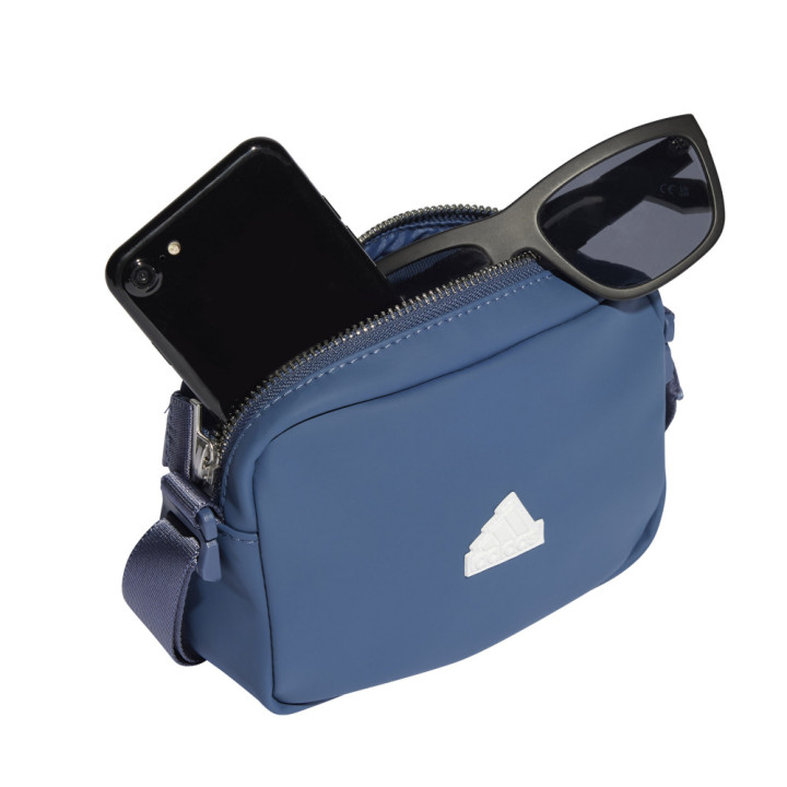 Saszetka na pasku adidas PU ESS Bag niebieska IT1948 | VUX.pl